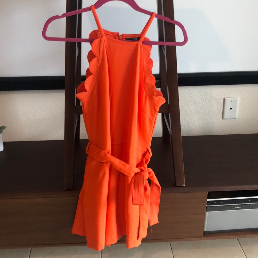 Fun BRIGHT orange jumpsuit. Gently used.